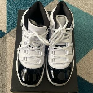 Air Jordan 11 Jordan, black and white sneakers